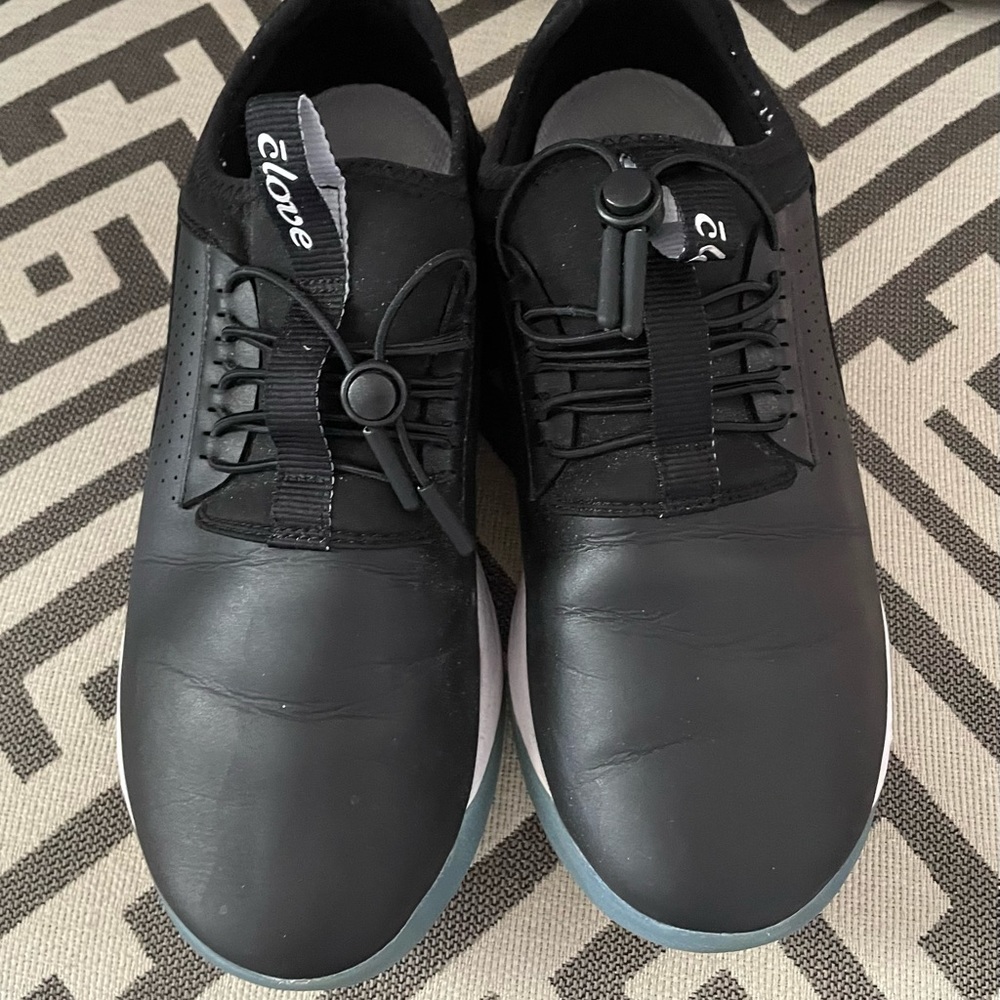 Gently worn Cloves sneakers.